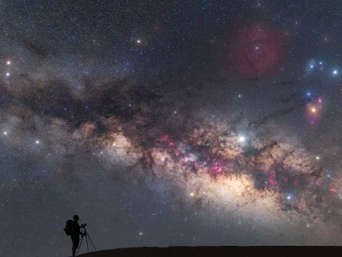 In "Alone & Together in the Stardust," Marco Carotenuto captured a lone silhouette in the Sahara Desert.