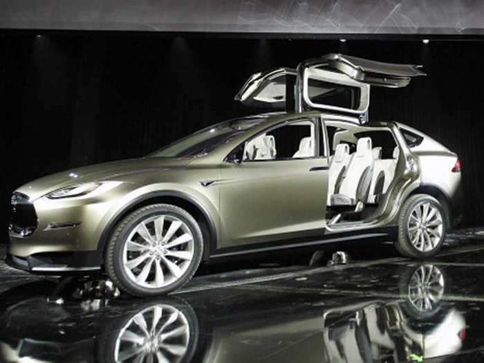 7. The Model X is revealed. Tesla pulled the cover off its much-anticipated SUV in 2012. The "falcon wing" doors were the standout feature. But it would be three years before the Model X would officially launch.