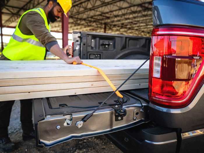 Ford says each new F-150 comes standard with new cleats that are mounted to the sides of the tailgate that serve as tie-down anchors for longer items you put in the bed.