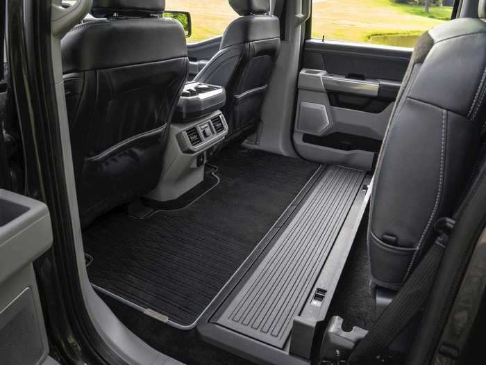 The F-150 crew cabs have an easily accessible flat load floor in the back that you can carry big items with.