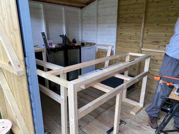 With the fridges installed, the couple got to work using wood they