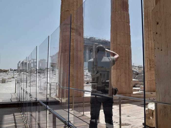 While the Acropolis site is outdoors and can host up to 2,000 people at a time,only a limited number of tourists will be allowed in, and safety measures, including plastic dividers, will encourage them to respect social distancing rules.