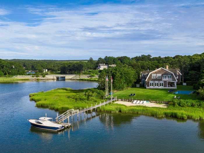 The home sits on two acres overlooking the North Sea Harbor in Southampton and comes with a heated pool, private beach, and 85-foot dock.