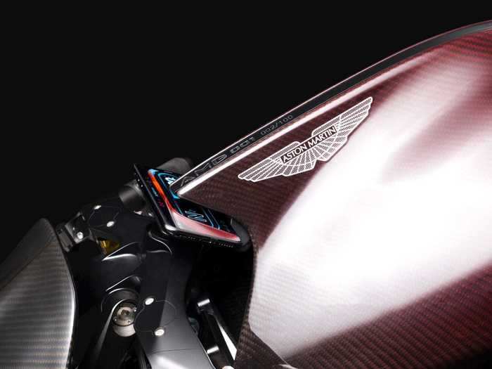 A key design feature is the aluminum “fin” that runs along the carbon-fiber gas tank, under the saddle, and onto the rear.