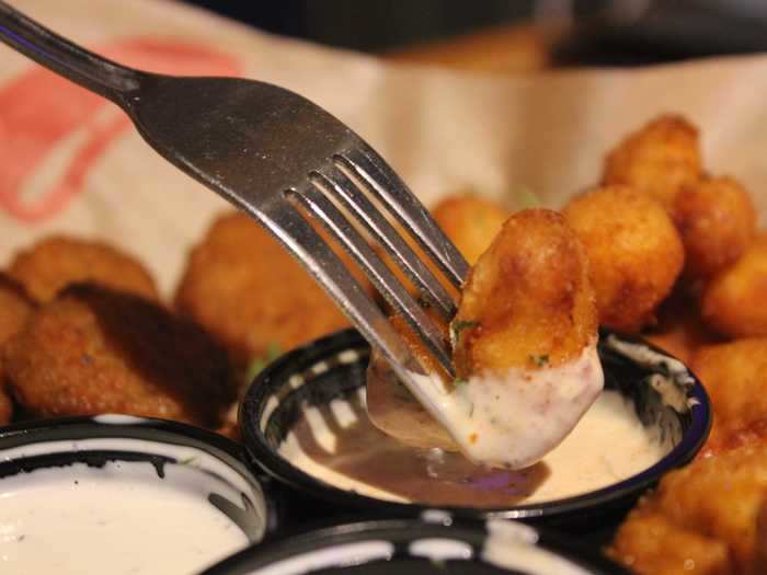 Each bite of fried food was steaming hot, which was the one thing I was missing from my to-go orders. The cheese inside the curds was stretchy, while the fried pickles were so hot, they burned my tongue.