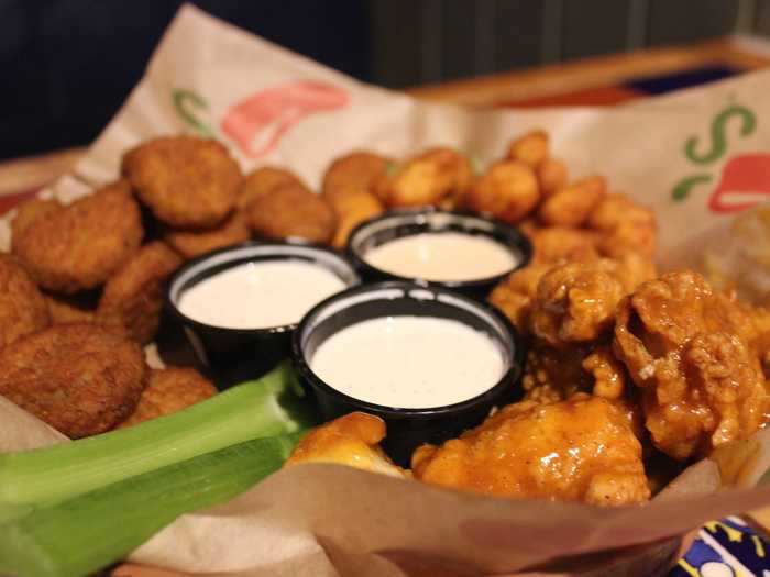 Along with a meal, my dining partner and I decided to order an appetizer. We chose the triple dipper for $13.49, where we chose what appetizers to include in a basket. We ordered mango habanero crispers, crispy cheddar bites, and fried pickles.