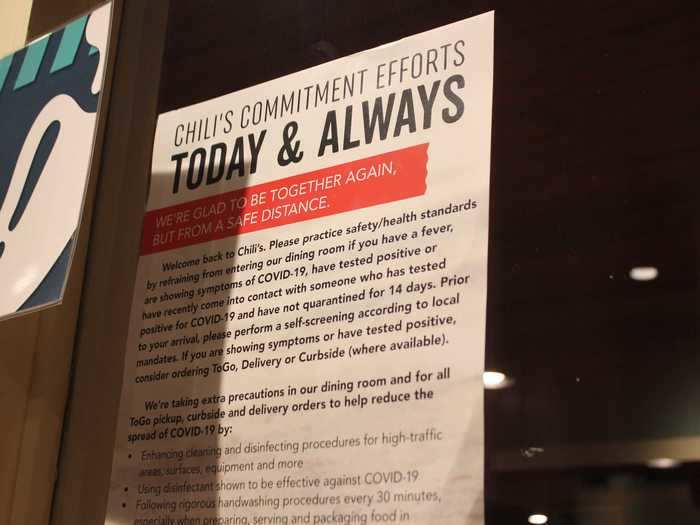 Immediately in the lobby, I was greeted by a hand-sanitizing station and a set of guidelines to follow during COVID-19, including a request to perform a "self-screening" prior to entering the restaurant.