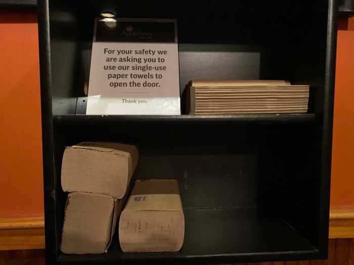 While waiting for my food, I stopped by the bathroom. Outside of the restroom, a stack of paper towels was provided, where a sign encouraged diners to use one for the door handle. I obliged and appreciated the thought.