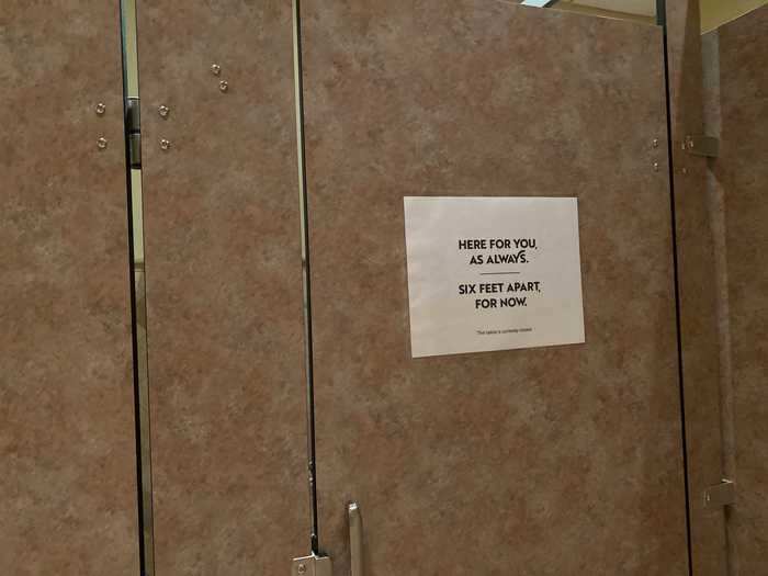 Later, when I went to the restroom, one of the stalls was locked with a sign noting, "closed for social distancing."