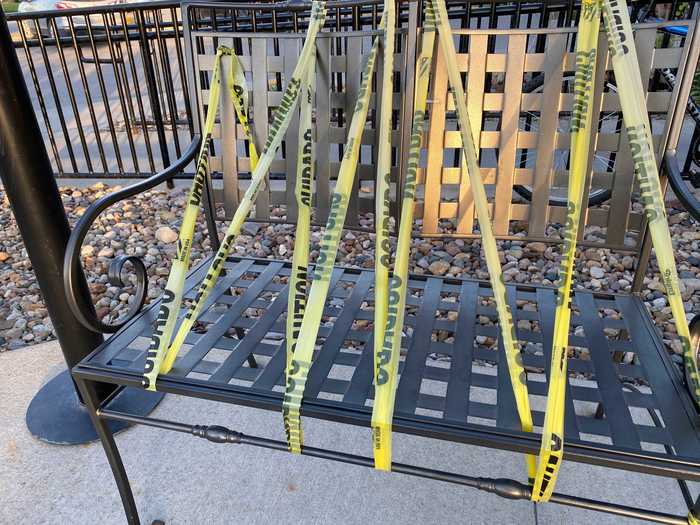 When I arrived at the restaurant, most people stood outside instead of waiting in their cars. Every other bench was wrapped in bright yellow "caution" tape to encourage social distancing.