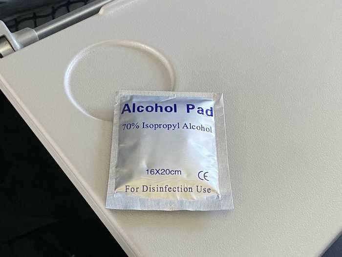 Everybody was given these alcohol pads upon boarding to wipe down seats or sanitize hands.