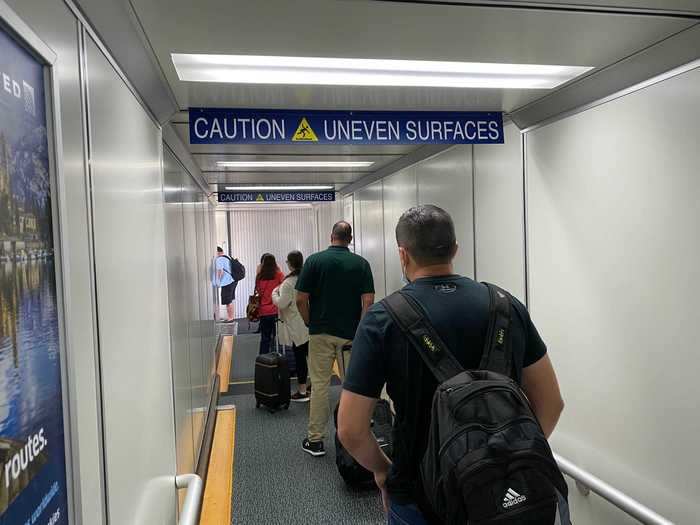 That was, of course, after first class and United elites boarded first. The jetway had no markers or placards reminding people to social distance, though it didn