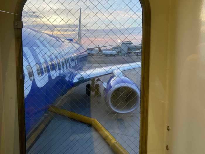 Passengers still board with their assigned number and the front half typically fills up first. Those boarding last have to walk past those who boarded and head to the back.