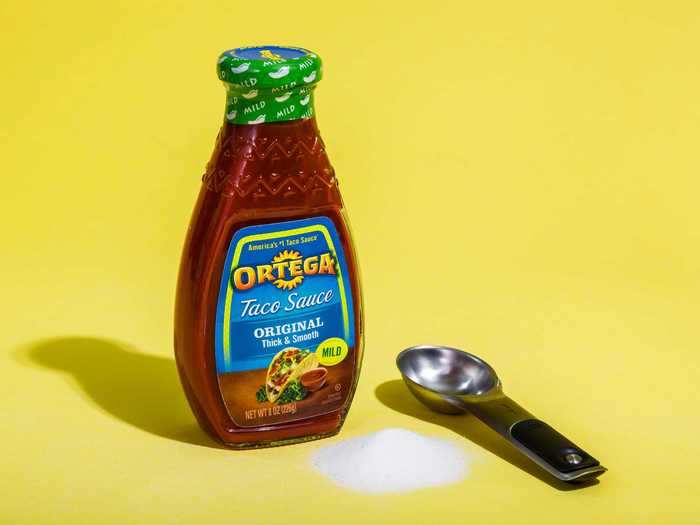 An eight-ounce bottle of Ortega mild taco sauce contains around 1 tablespoon of sugar.