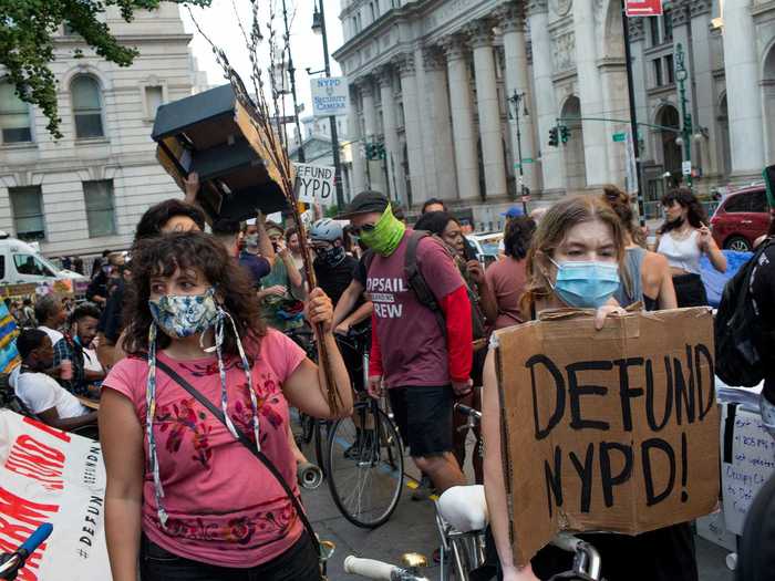 On Monday, Mayor Bill de Blasio agreed to cut $1 billion from the NYPD by canceling the hire of 1,163 new police officers and shifting safety patrol officers in schools from the control of the police to the Department of Education. But many protesters say that