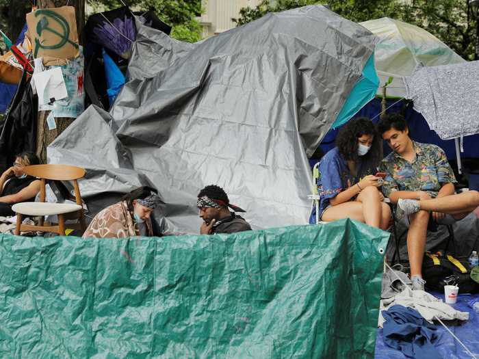 With tents set up and music frequently filling the air, the zone can sometimes take on the feeling of a music festival or party.