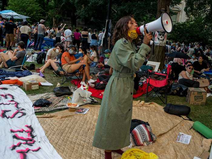 During the day, protesters listen to speeches, make signs, meditate, play cards and music, and engage in open dialogue.