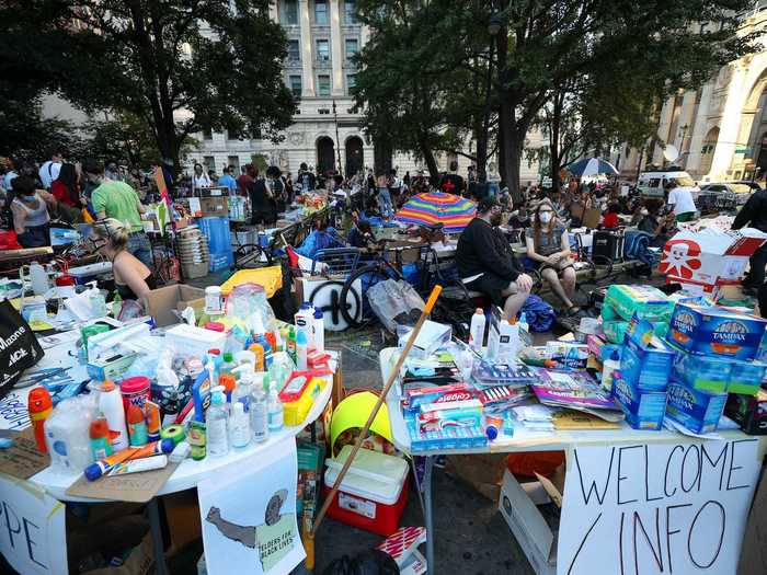 Organizers have set up a welcome desk with information and supplies.