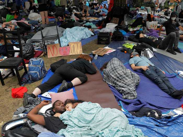 Many volunteers work around the clock to service the self-reliant zone, with some protesters sleeping during the day in order to keep things up and running at night.