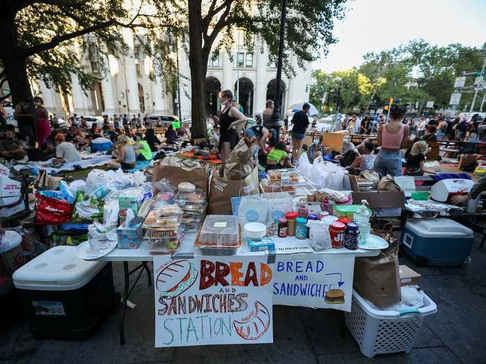 Volunteers have taken in large quantities of food donations and set up an organized system of resource distribution, safety, and sanitation services throughout the park.