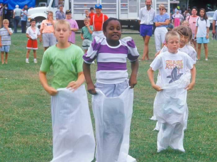 Plenty of people will remember taking part in potato sack races on July 4, like the children pictured below in 1991.