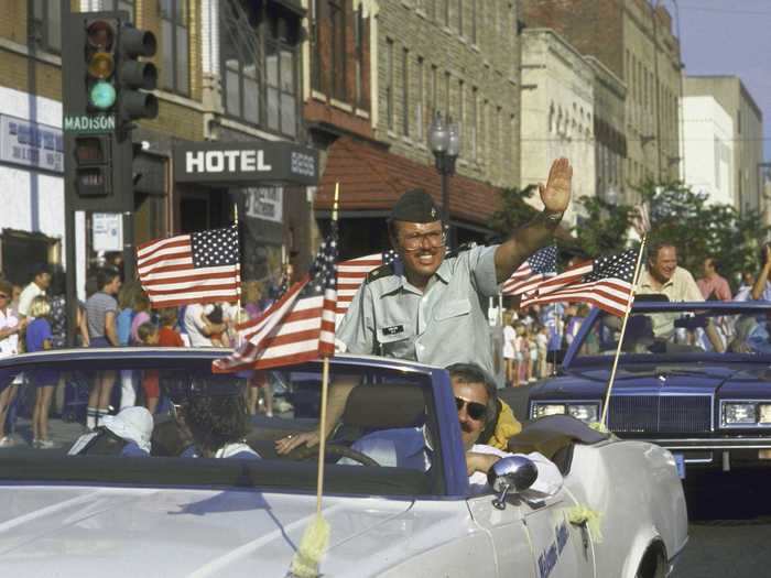 On July 4, 1985, plane hijacking survivor, Kurt Carlson, waved to the crowd.