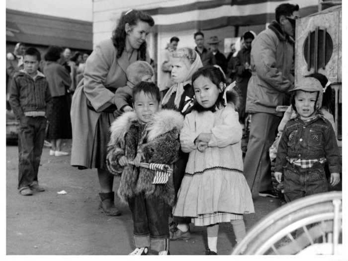 Fourth of July celebrations look a bit different in Alaska, as shown by these children in heavy coats.