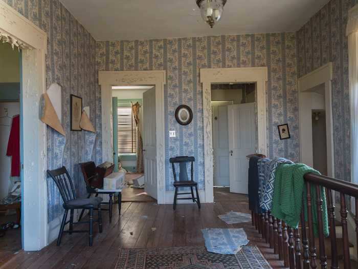 An upstairs hallway leads to several rooms that held even more interesting artifacts from the home