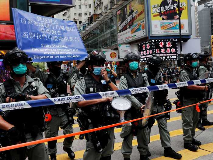 But the language of the law is ambiguous, and many fear the Chinese government will use its new authority to impose a broad range of penalties on Hong Kongers.