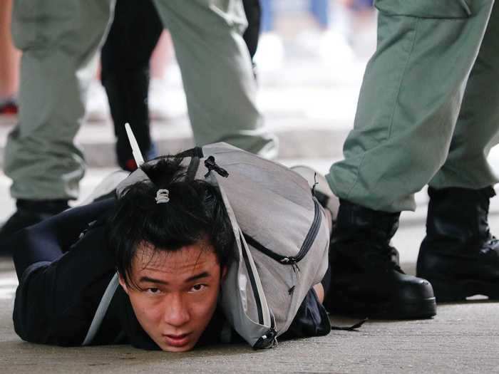 On June 30, police were told to arrest anyone in violation of the new law who was seen waving independence flags or chanting pro-democracy slogans, CNN reported.