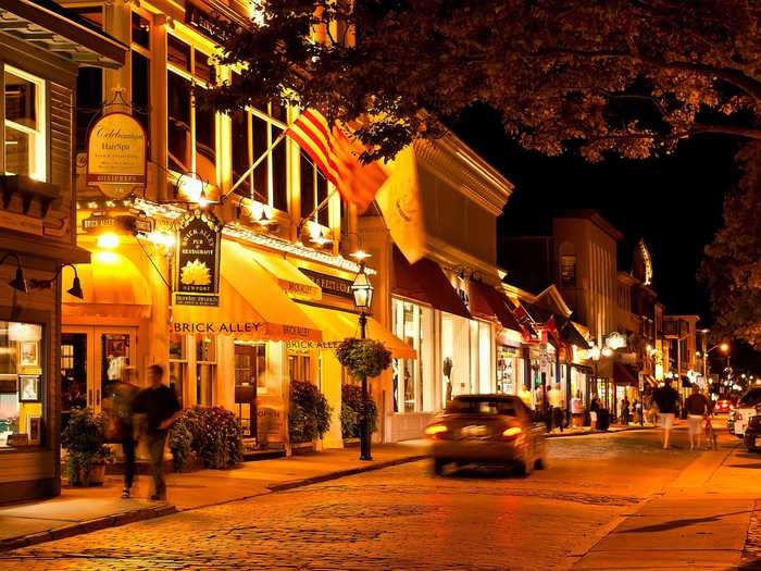 RHODE ISLAND: Thames Street in Newport lights up at night.