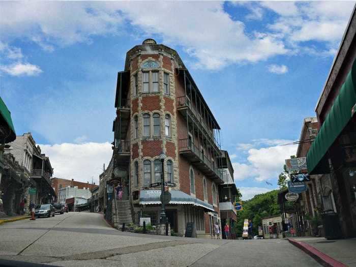 ARKANSAS: Main Street in Downtown Eureka Springs features Victorian architecture, shops, and galleries with an old-fashioned carriage ride.