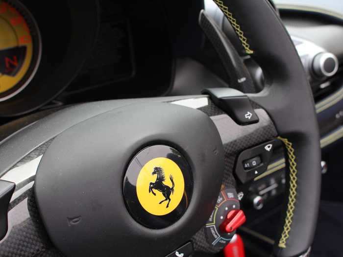 Carbon fiber, leather, and the prancing horse, all together, as well as turn signals and just about everything one needs to operate the car.