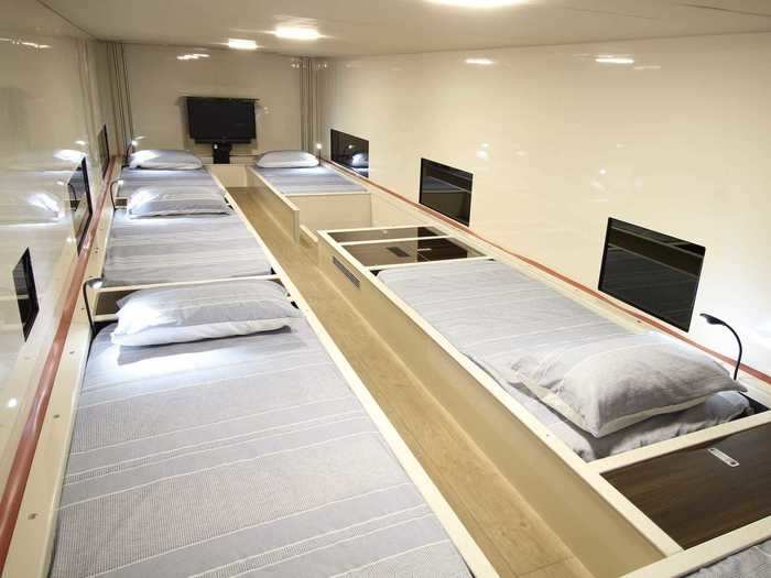 Upstairs, there is a TV and six mattresses that lift up to reveal under-bed storage.