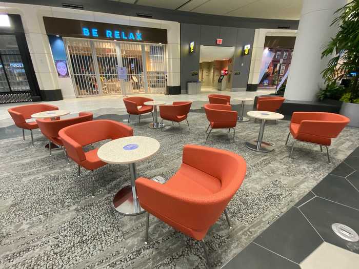 The designers wanted to make the area a place for passengers to hang out before heading to the busy concourses below or even a place to retreat to during a layover or delay.