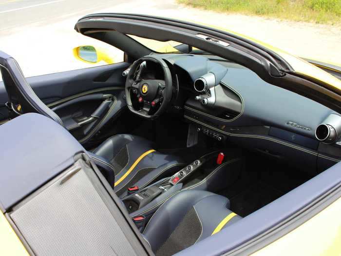 The droptop supercar costs $397,000 in the very well-equipped, "Giallo Modena" version I drove. The interior was a sporty "Blu Sterling."