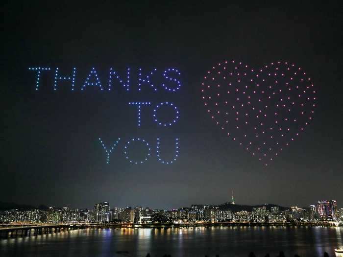 During the show a massive "Thanks to you" message lit up the sky before the drones formed an outline of the Korean peninsula and encouraged people to "Cheer up."