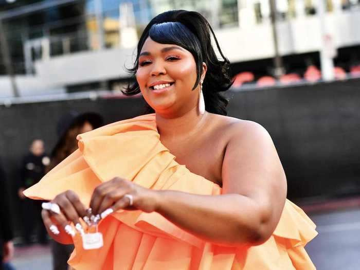 The singer showed off her tiny bag at the AMAs 