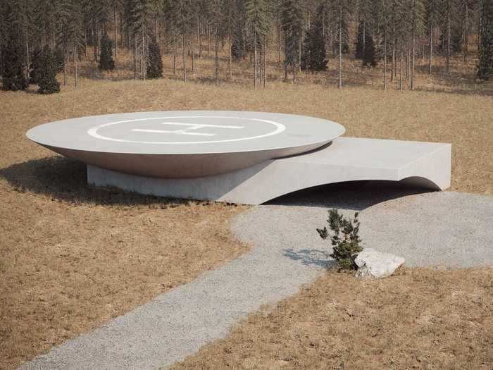 Called "Underground House Plan B," the concrete bunker is shaped like a flying saucer and comes with a rooftop helipad.