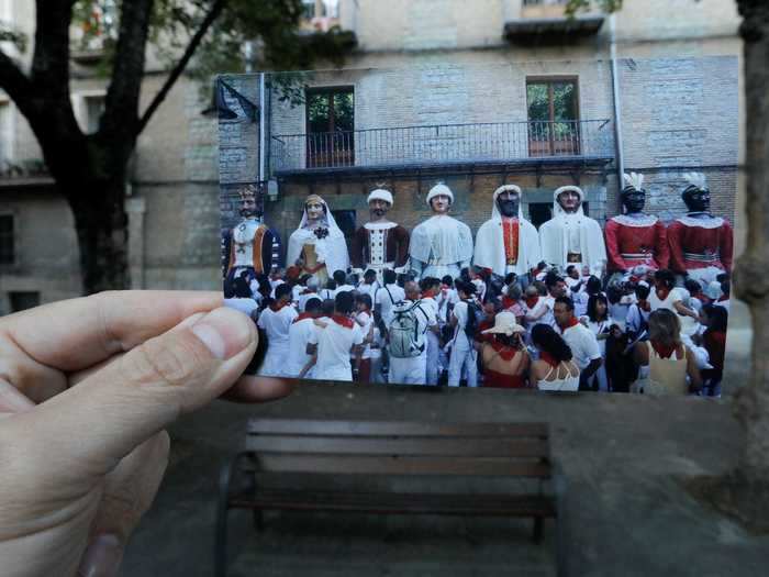 A number of parades take place throughout the festival, too. This photo shows people taking part in the "Procession of Giants and Big Heads," which is a march of 25 massive paper-mâché figures that dance through the street each morning.