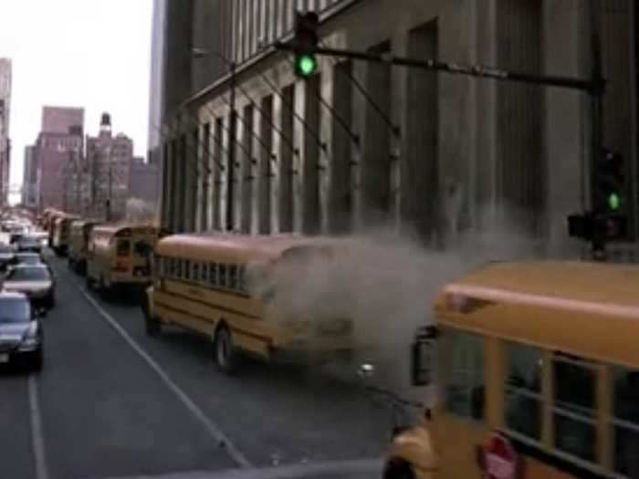 No one thought it was strange to see a dusty school bus driving out of a wall in a bank?