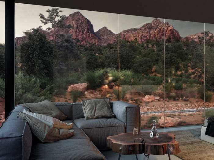 Reflective, bronze-tinted floor-to-ceiling windows offer unobstructed views of Sedona