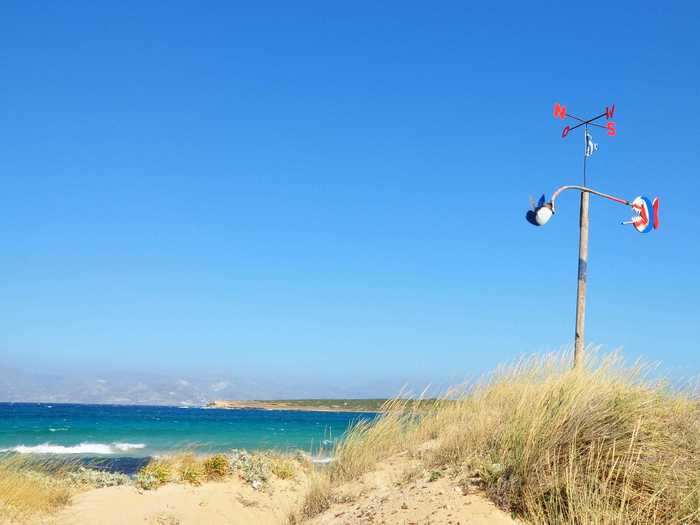 Shallow Santa Maria beach is great for families — but also for drinks at sunset.