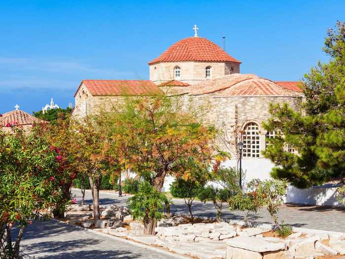 One of its most famous sites is Panagia Ekatontapiliani church, built in the 4th century and known as "the Church with the Hundred Doors," according to Greek travel site Greeka.