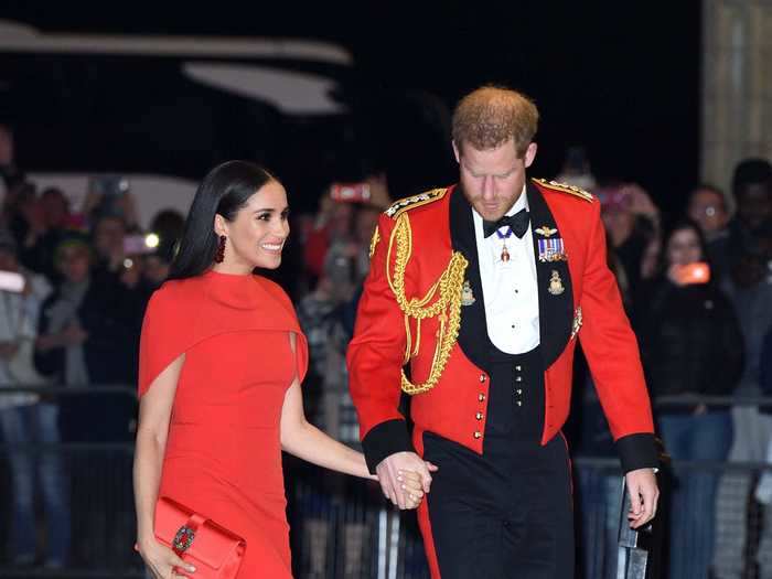 Harry and Markle were the ultimate power couple with coordinated outfits at the Mountbatten Festival of Music.