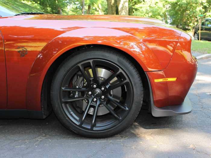 The 20-inch wheels are "Carbon Black" aluminum, front ...