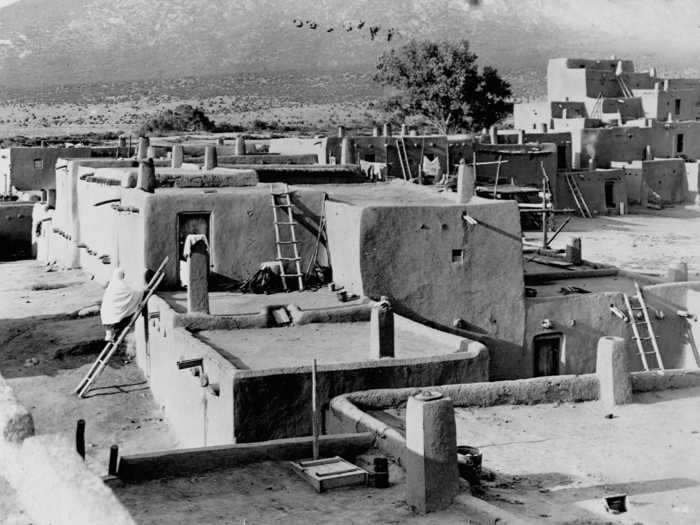 Taos, New Mexico, seen below between 1920 and 1940, was established as early as 1000 AD by the Taos Pueblo people.