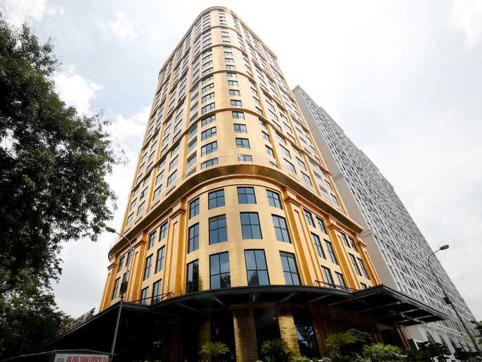 From its sparkling rooftop infinity pool down to its toilet seats, the 25-story Dolce Hanoi Golden Lake hotel is, quite literally, dripping in gold.