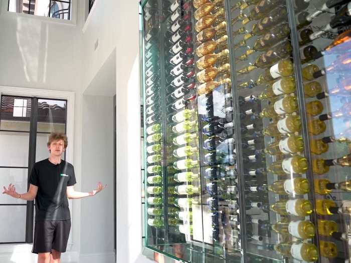 Right at the entrance, the mansion has a 160-bottle wine display, although Formula says none of them drink wine.