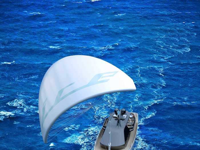 The kite — which spans 1,700 square feet and soars 600 feet in the air — aids the motors to increase the 210-foot vessel